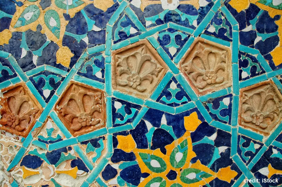fragments of tiles in wall